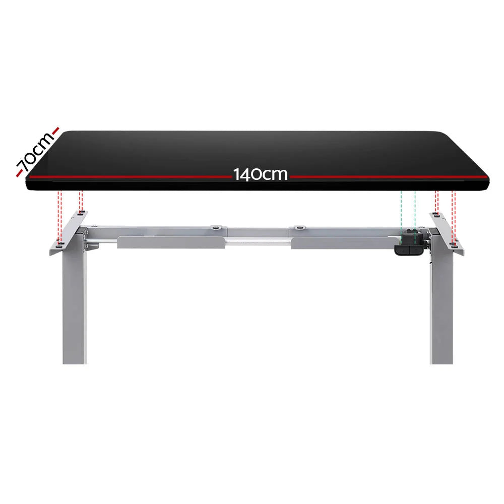 Black 140cm standing desk with desktop shelf and metal side legs