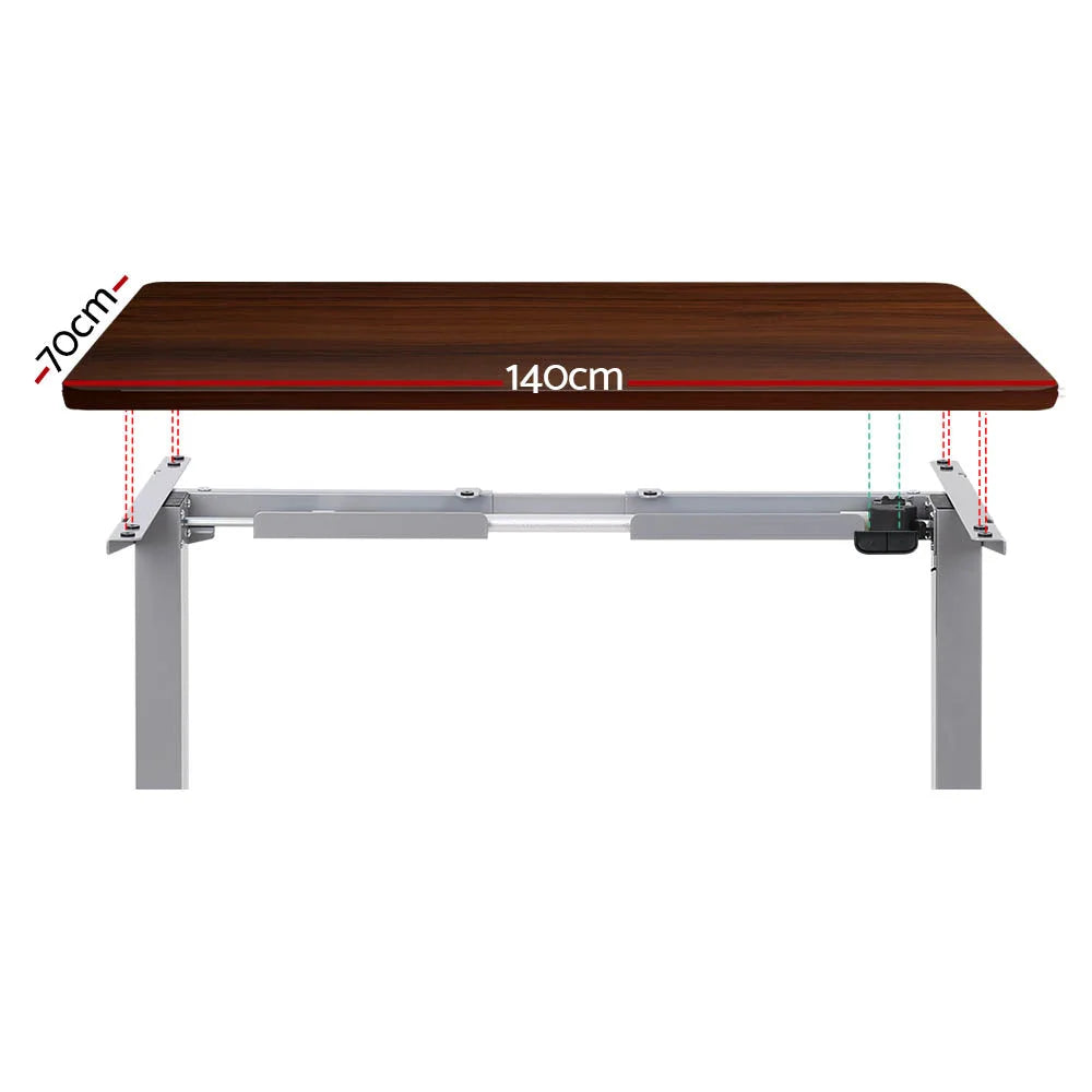 Grey 140cm standing desk with desktop shelf and metal side legs