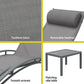 Grey steel outdoor sun lounge with folding lounger seat and slatted footrest