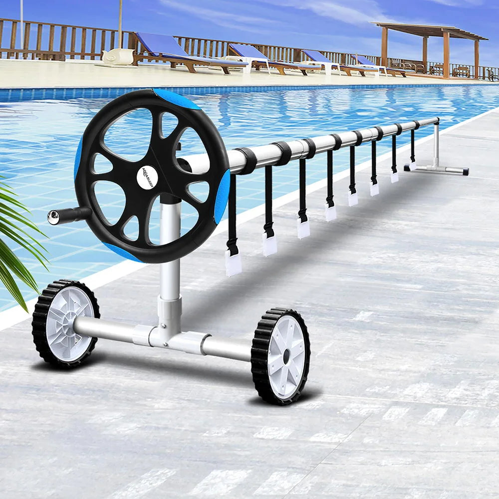 Blue steel swimming pool cover with solar cover roll for pool water