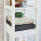 Tall cabinet standing with drawer storage and cupboard doors