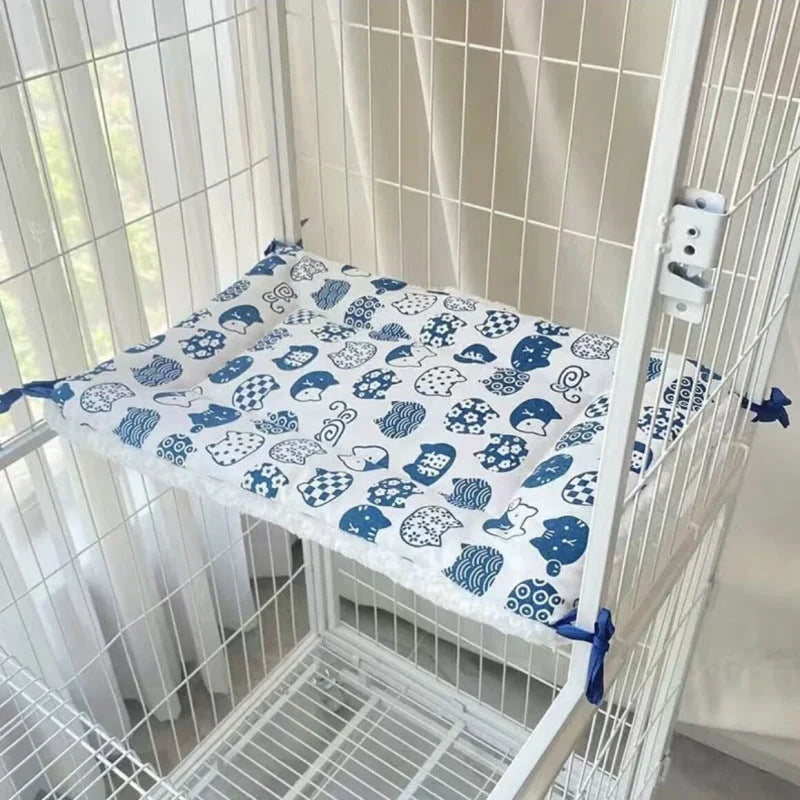 Tie-On Cat Cage Platform Pad - Blue cat pattern on white