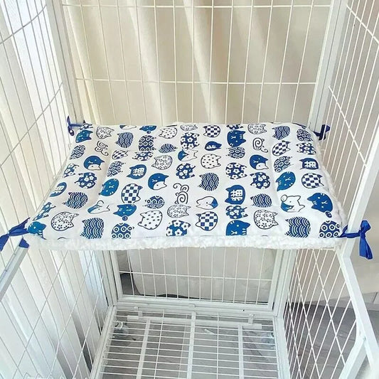 Tie-On Cat Cage Platform Pad - Blue cat pattern on white