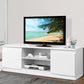 White entertainment unit with natural timber finish and sliding door storage