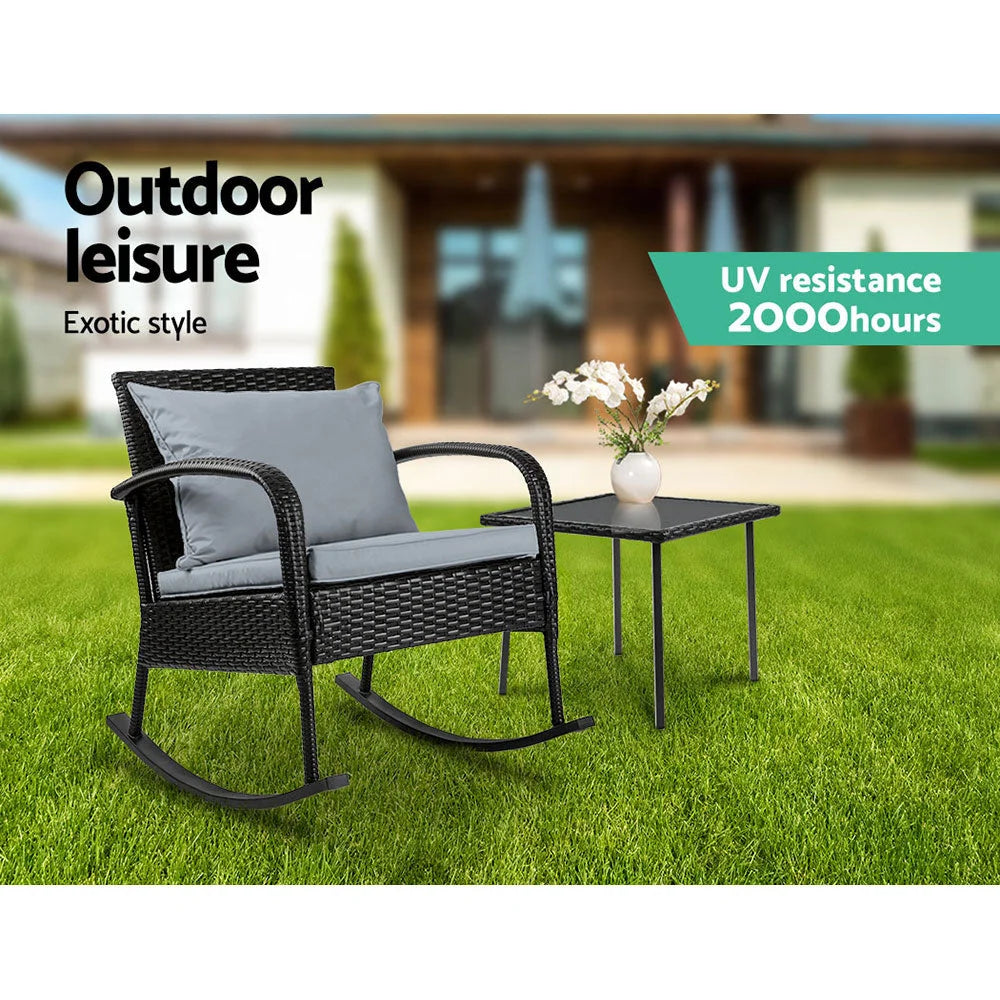 Black wicker rocking chairs table with upholstered seat and curved back