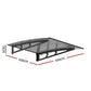 Grey metal window door awning with curved awning cover and wall supports
