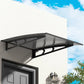 Grey metal window door awning with canopy sheet and black metal brackets