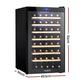 Black wine cooler fridge with glass door and black cabinet casing