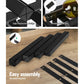 Black timber storage rack with display shelves and upright posts